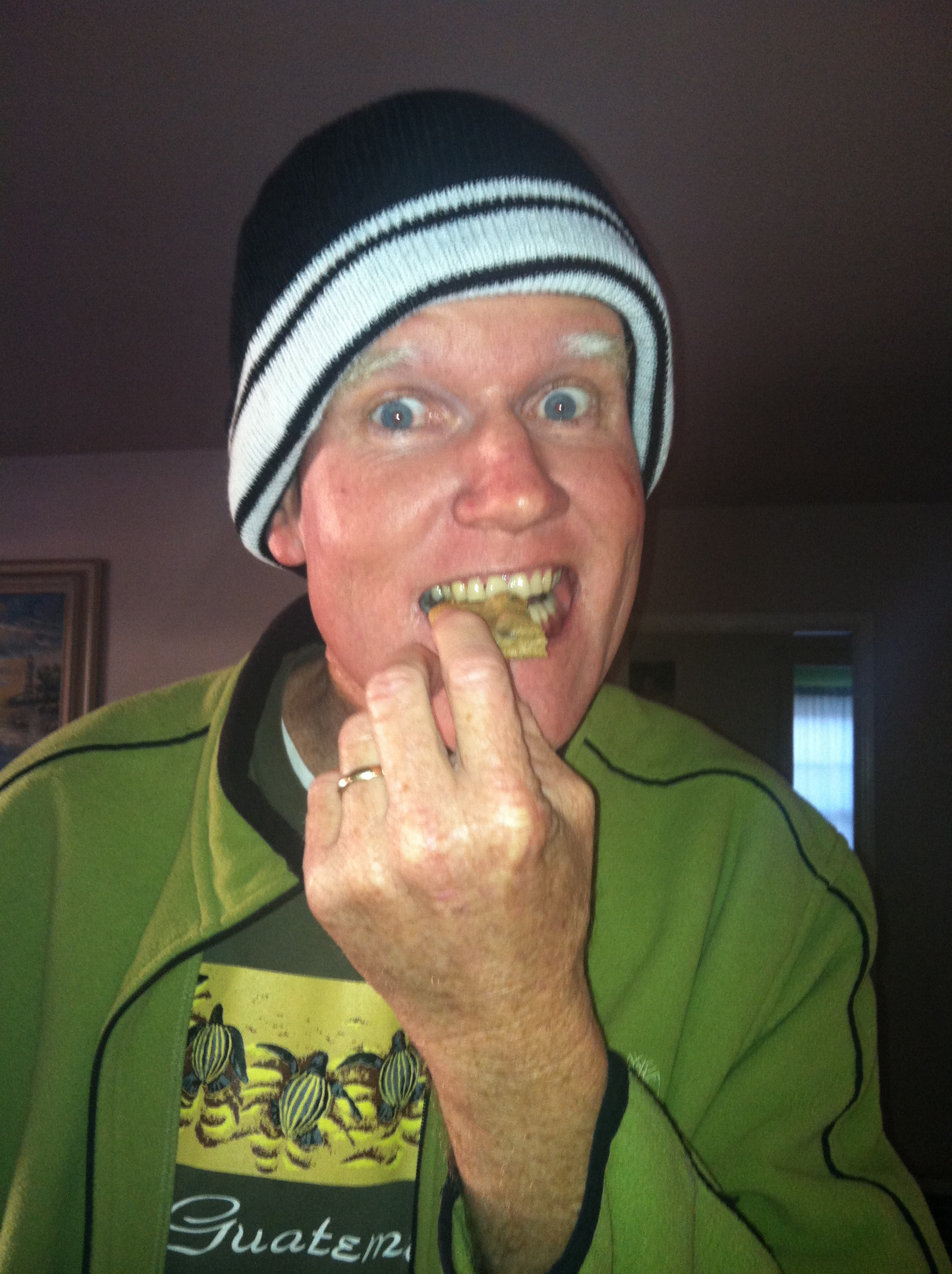 The man behind the MustardSeedBudget ravenously devouring Christmas cookies.