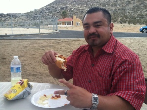 Frank Cervantes enjoys the chili dogs served between outreaches